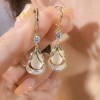 Real gold electroplated geometric water drop cat's eye stone earrings are versatile and slimming for the face. The water drop earrings have a niche design and are earrings for women Real gold electroplated geometric water drop cat's eye stone earrings are versatile and slimming for the face. The water drop earrings have a niche design and are earrings for women