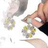 European and American cross-border circular hollowed-out zircon flower earrings are grand, exaggerated, and personalized. They are niche, light luxury, retro and high-end European and American cross-border circular hollowed-out zircon flower earrings are grand, exaggerated, and personalized. They are niche, light luxury, retro and high-end