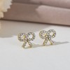 Korean version of light luxury pearl bow stud earrings, a trendy and high-end ear accessory, small and versatile s925 silver needle earrings