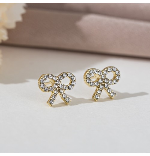 Korean version of light luxury pearl bow stud earrings, a trendy and high-end ear accessory, small and versatile s925 silver needle earrings