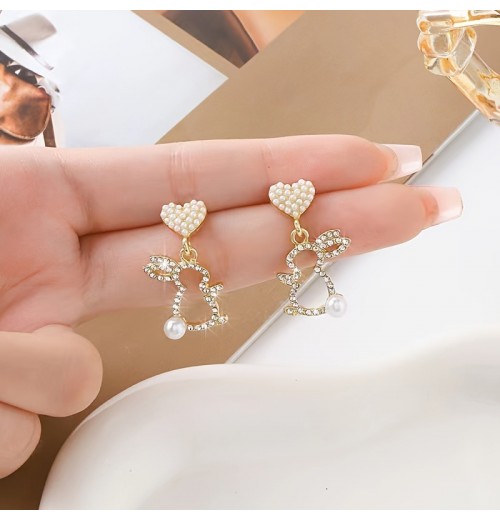 Easter asymmetrical stud earrings, a popular online celebrity, are exquisite and versatile earrings with a niche design. They are cross-border diamond-encrusted and pearles-encrusted Easter asymmetrical stud earrings, a popular online celebrity, are exquisite and versatile earrings with a niche design. They are cross-border diamond-encrusted and pearles-encrusted