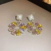 European and American cross-border circular hollowed-out zircon flower earrings are grand, exaggerated, and personalized. They are niche, light luxury, retro and high-end European and American cross-border circular hollowed-out zircon flower earrings are grand, exaggerated, and personalized. They are niche, light luxury, retro and high-end
