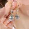 Real gold electroplated geometric water drop cat's eye stone earrings are versatile and slimming for the face. The water drop earrings have a niche design and are earrings for women Real gold electroplated geometric water drop cat's eye stone earrings are versatile and slimming for the face. The water drop earrings have a niche design and are earrings for women