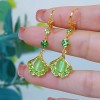 The light luxury and high-end green ginkgo leaf cat's eye stone long tassel earrings are fashionable and elegant, and are popular earrings for women The light luxury and high-end green ginkgo leaf cat's eye stone long tassel earrings are fashionable and elegant, and are popular earrings for women