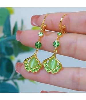 The light luxury and high-end green ginkgo leaf cat's eye stone long tassel earrings are fashionable and elegant, and are popular earrings for women