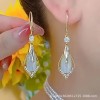 This pair of earrings features a light luxury design for women, with geometric diamond-encrusted cat's eye stone earrings that are versatile and elegant. It is a long and unique French-style ear accessory This pair of earrings features a light luxury design for women, with geometric diamond-encrusted cat's eye stone earrings that are versatile and elegant. It is a long and unique French-style ear accessory