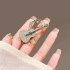 Design sense, individuality, niche musical note guitar brooch, high-end and elegant clothing pin, new suit accessory Design sense, individuality, niche musical note guitar brooch, high-end and elegant clothing pin, new suit accessory