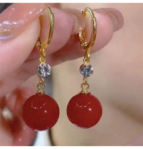 New trendy and retro red pearl earring style best-selling high-end and elegant niche earrings, round face slimming earrings for women New trendy and retro red pearl earring style best-selling high-end and elegant niche earrings, round face slimming earrings for women