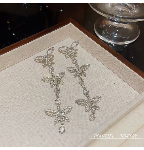 The new 925 silver needle wedding photo long tassel earrings for women who are  diamond earrings exude a sense of elegance and sophistication